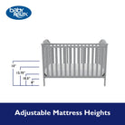 Gray crib with adjustable mattress heights feature and Baby Relax logo on a white background
